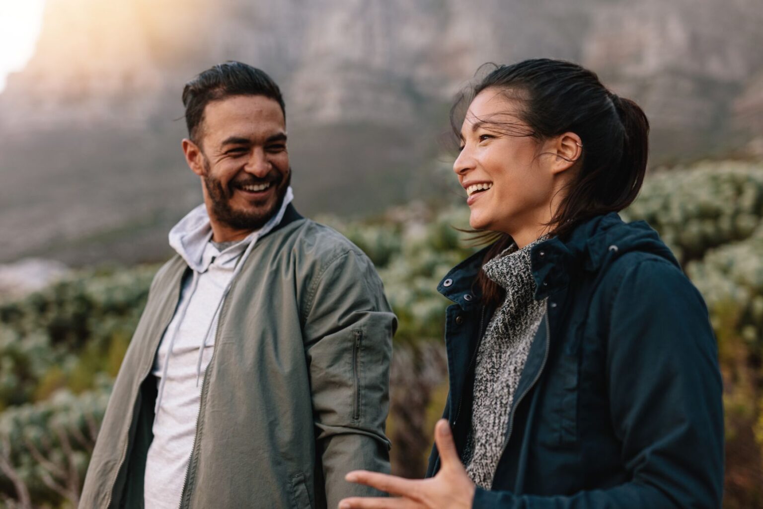 after aphasia treatment woman with aphasia talking with man on a hike